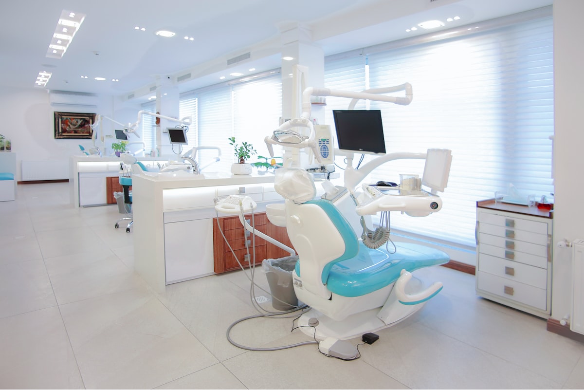 Bright dental clinic room with treatment chair