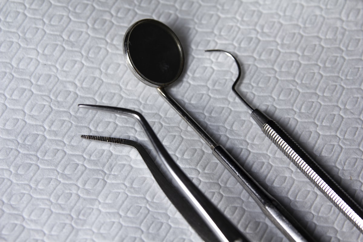 Dental mirror and instruments on a tray