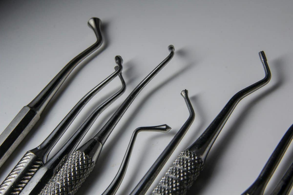 Close-up of dental hand instruments on a table