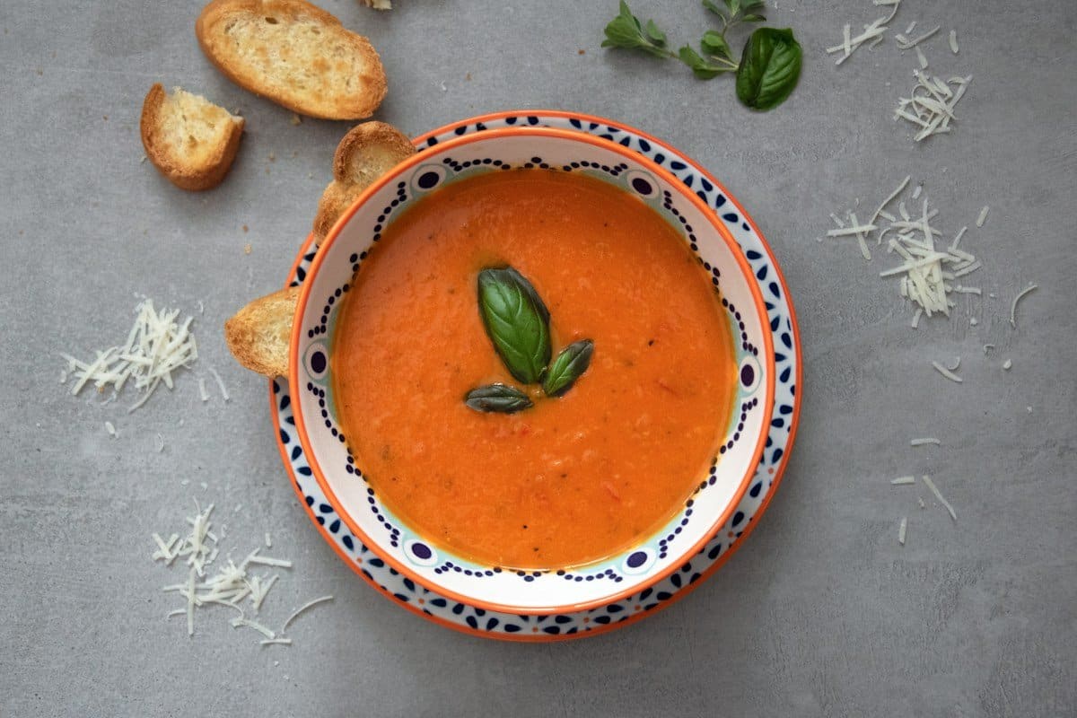 Bowl of tomato soup, an example of soft food after implant placement