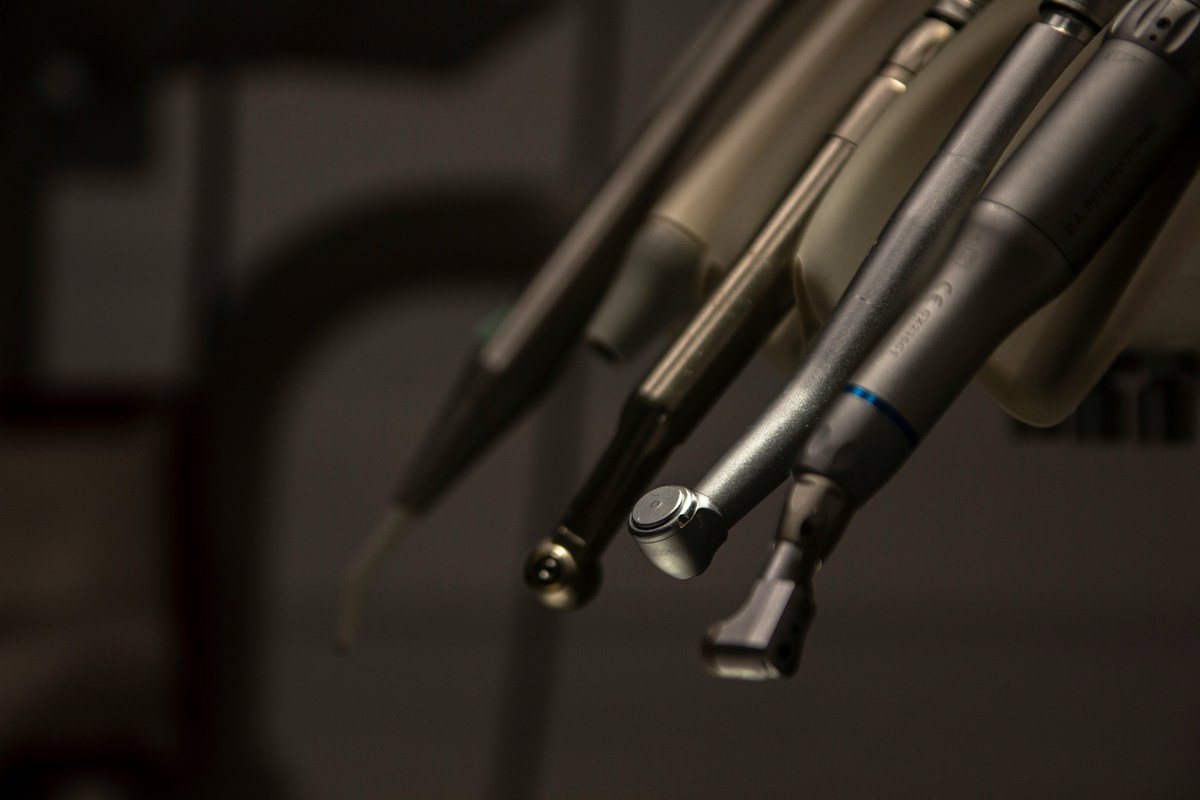 Dental handpieces resting on a treatment unit