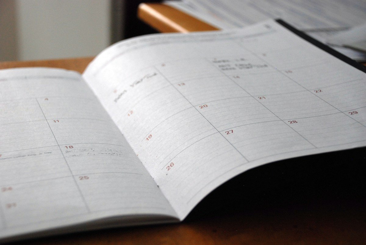 Open monthly planner on a desk, there is no fixed timeline for a tooth nerve dying
