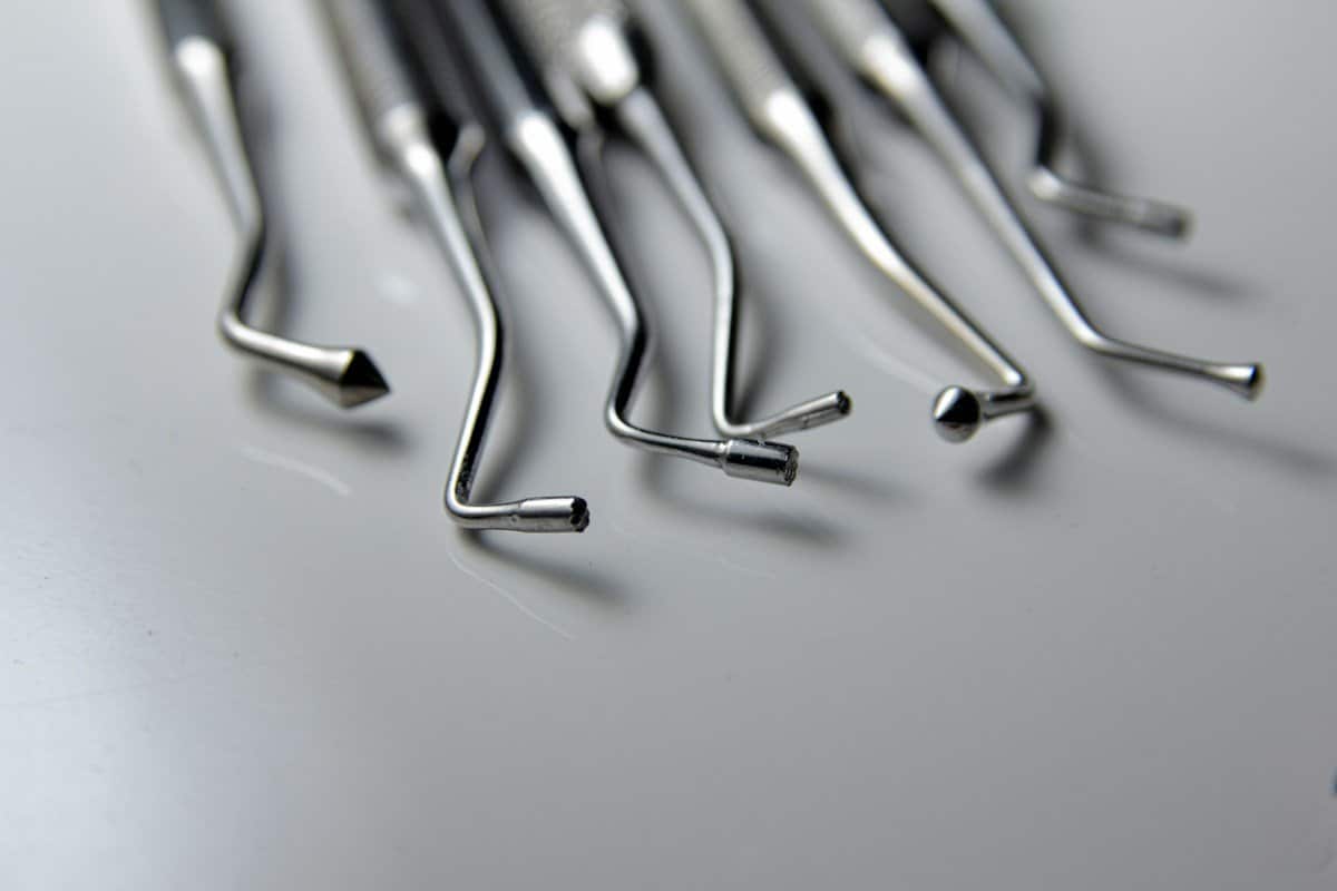 Close-up of dental hand instruments used during an exam
